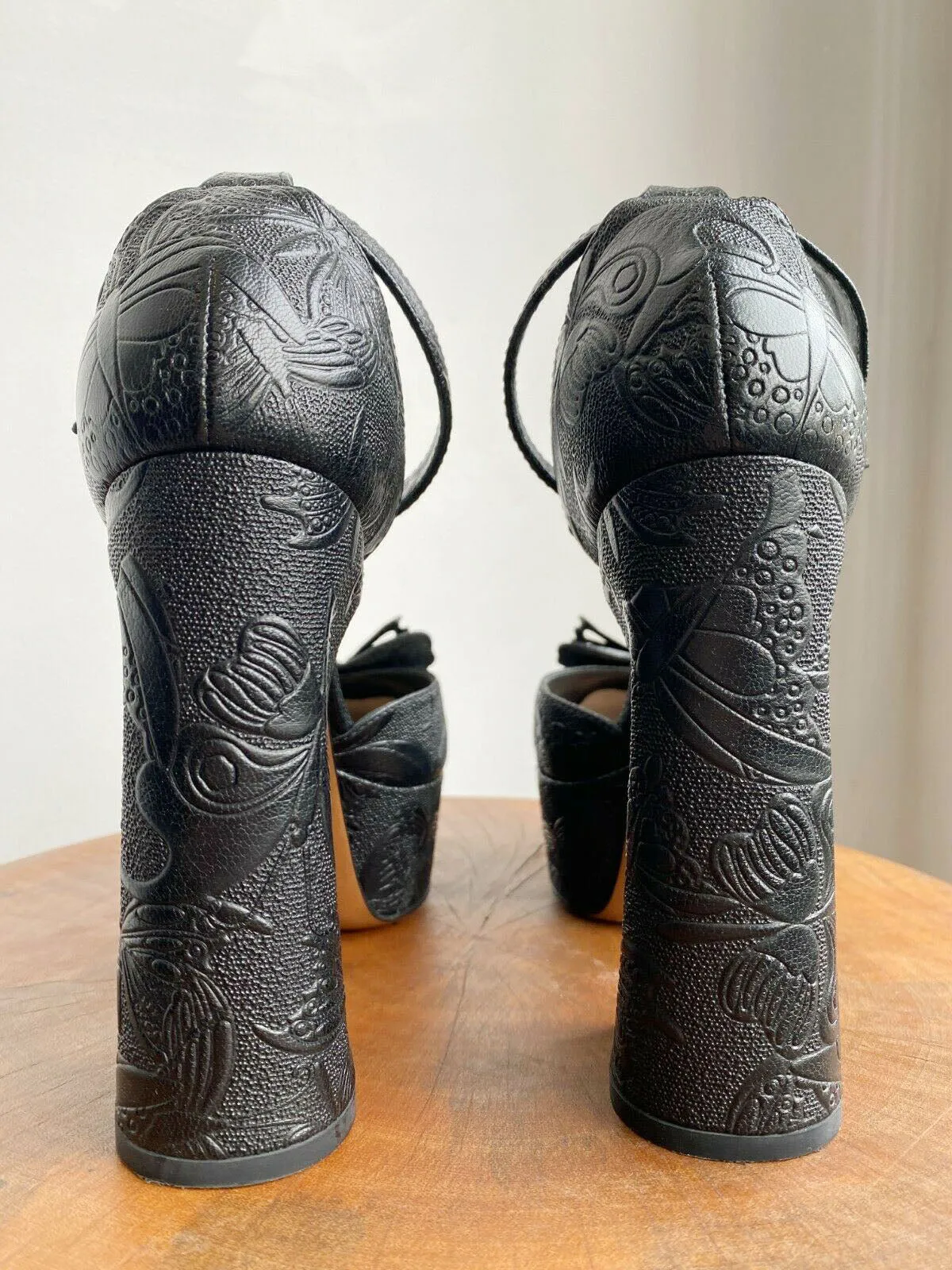 BUTTERFLY EMBOSSED PLATFORMS